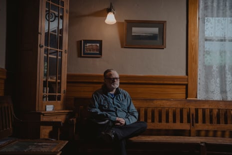 Man sits down on bench