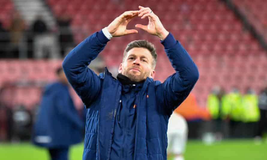 Luke Garrard shows his love for the Boreham Wood fans after their win over Bournemouth.