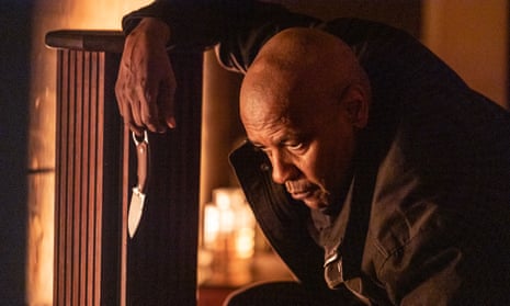 Denzel Washington in The Equalizer 3, an open penknife dangling from one finger