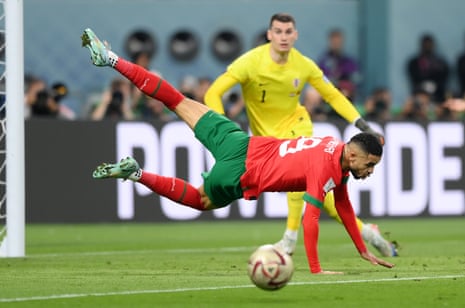 Youssef En-Nesyri of Morocco dives for the ball.