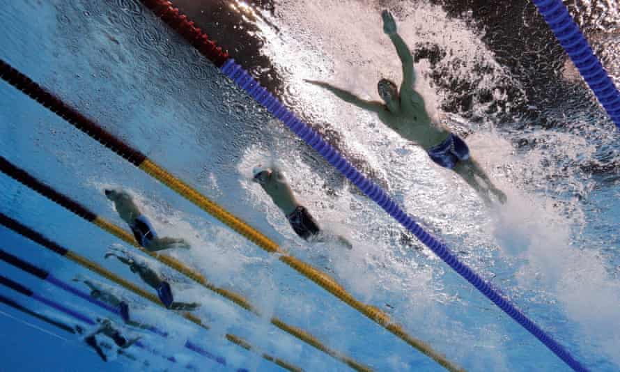 Michael Phelps of the United States, Zhuhao Li of China and Joseph Schooling of Singapore compete in the men’s 100m butterfly final.