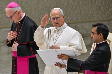 Pope Leo and two aides.
