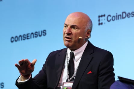 a man speaks into a headset microphone
