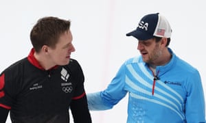Mikkel Krause of Denmark and John Shuster chat after their last round-robin game.