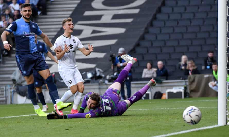 Stockdale hailed as ‘best in League One’ after Wycombe make playoff final | League One 2 Wycombe’s David Stockdale produced a series of stops to restrict MK Dons to one goal, with his side 2-0 up on aggregate from the first leg.