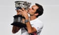 Roger Federer kisses the winner's trophy