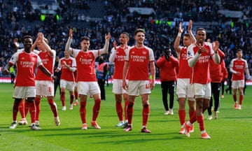 Arsenal players celebrate after the Premier League match between Tottenham Hotspur and Arsenal at Tottenham Hotspur Stadium