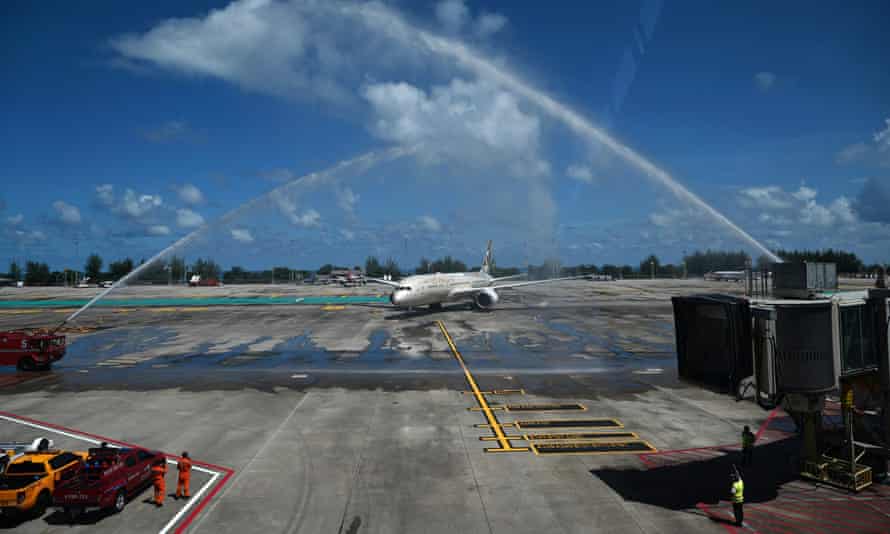 Celebratory sprays of water are prepared for an Etihad Airways plane arriving from Abu Dhabi carrying passengers for the Phuket Sandbox tourism scheme.