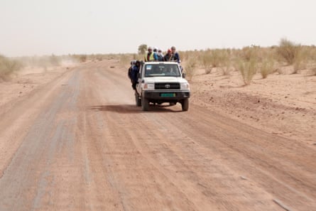 Members of the M’bera camp Brigade Anti-Feu drive to their training exercise. Before the rainy season, wildfires become a risk