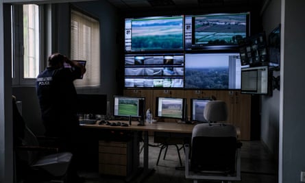 A control room with 11 monitors and 30 cameras for surveillance along the Evros River in Nea Vyssa, Greece.
