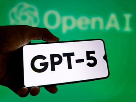shadow of hand holds phone screen that reads ‘GPT-5’