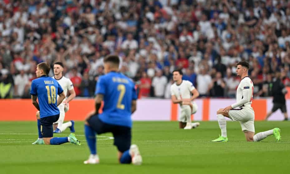 England and Italy players take the knee before Sunday’s Euro 2020 final.