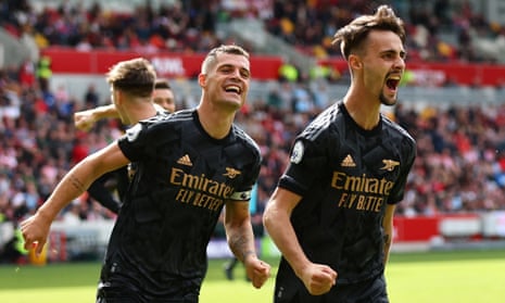 Arsenal's Fabio Vieira celebrates scoring their third goal with Granit Xhaka.