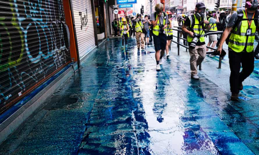 Blue dye liquid was used in water cannon near Tsim Sha Tsui district during the demonstration in Hong Kong Sunday.