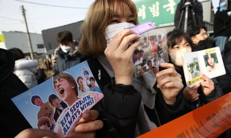 Fans wait to see BTS’s Jin begin military service in front of the 5th Infantry Division recruit training center on December 13, 2022 in Yeoncheon-gun, South Korea.