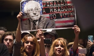 Bernie Sanders supporters hold a sign in Los Angeles during the 2016 election campaign.