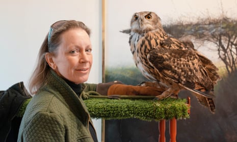 Frieda Hughes, photographed at home with one of her 13 owls