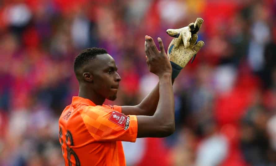 Édouard Mendy applauds Chelsea’s fans after his side’s victory at Wembley