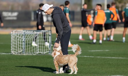 Bob Voulgaris on the training ground with his dog Oscar