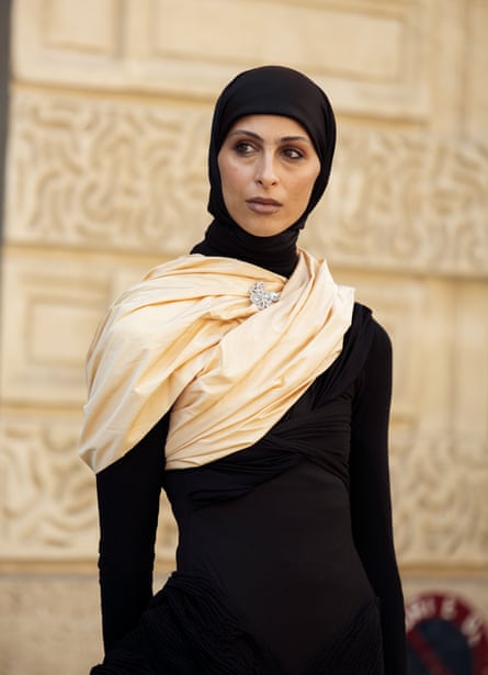 A guest outside the Peet Dullaert show as part of Paris fashion week this year