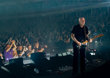 Albert Hall, London, 2024‘David is lit by the screen film for the song Time, which he’s turned around to watch for his cue.’