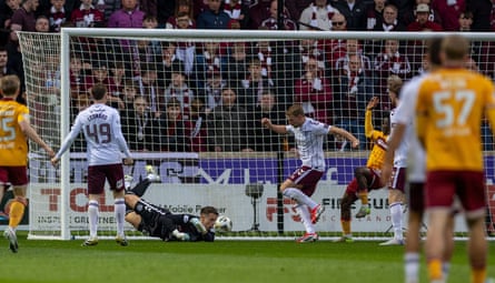 Stephen Kingsley of Hearts turns in an Emmanuel Longelo cross to score an own goal.