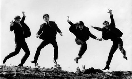 Photo of BEATLES<br>UNITED KINGDOM - APRIL 01: Photo of BEATLES; L-R: Ringo Starr, George Harrison, Paul McCartney, John Lennon - posed, group shot - jumping on wall, Used on the Twist &amp; Shout EP cover (Photo by Fiona Adams/Redferns)