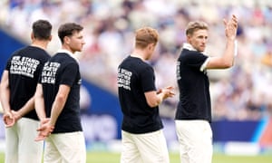 England players including captain Joe Root (right) line up wearing t-shirts campaigning against various discriminations.