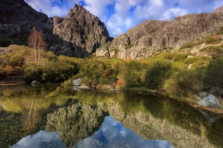 Reflections in a lake in Portugal’s mountains