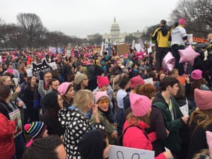 People gather on the National Mall in Washington DC as they make their voices heard on the first full day of Donald Trump’s presidency