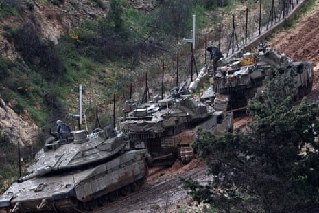Israeli tanks deployed along the northern Israeli border with Lebanon.