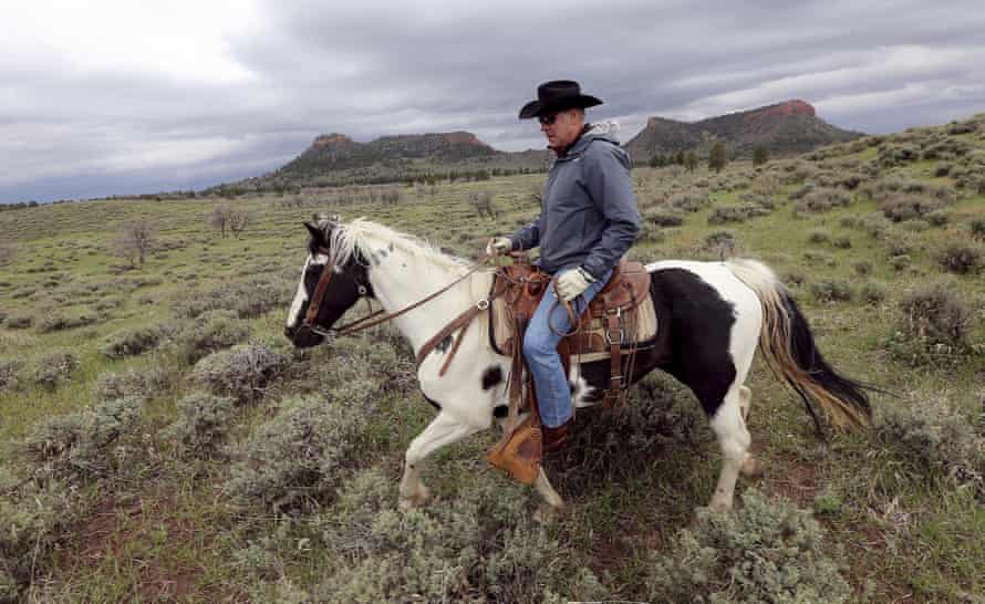 Ryan Zinke rides a horse in Bears Ears, a national monument downsized on his watch.