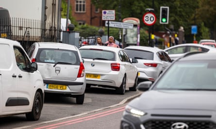 Cars parked on double red routes on Stafford Road close to where a traffic warden was attacked after a parking dispute.