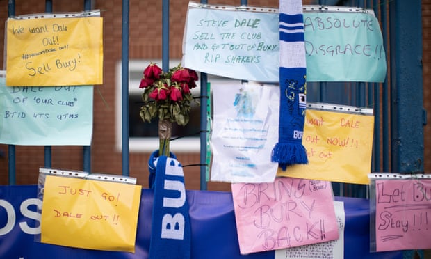 Messages left by Bury supporters attached to railings outside the club’s Gigg Lane ground following their expulsion from the English Football League.