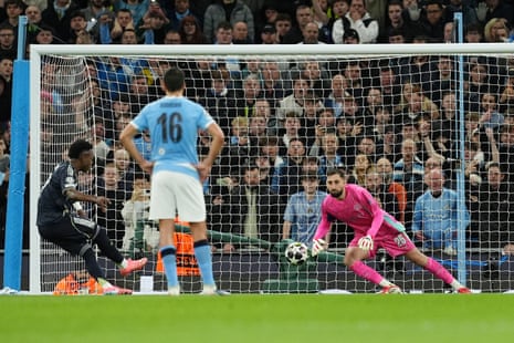 Real Madrid’s Vinicius Junior (left) scores their side’s first goal from the penalty spot.