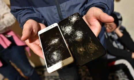 A migrant from Afghanistan with phones reportedly broken by police after his family attempted in to Croatia at the northern-Bosnian village of Bosanska Bojna.