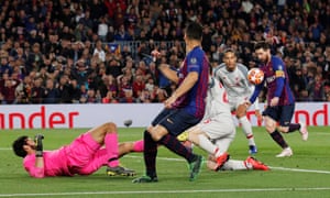 Barcelona’s Lionel Messi controls the ball after it cannons off the crossbar before slotting it into the empty net.