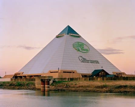 a pyramid-like structure by a body of water