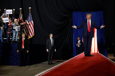 Donald Trump takes the stage during a campaign rally at the SNHU Arena in Manchester, New Hampshire, on Saturday.