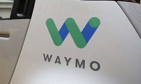 Waymo logo on side of vehicle