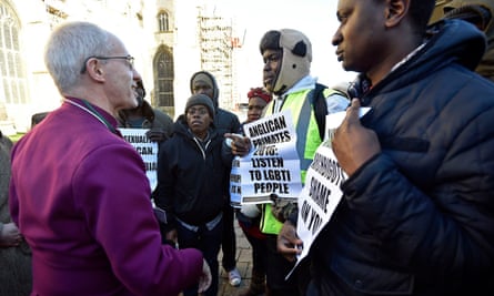 Justin Welby meets gay rights campaigners protesting outside Canterbury Cathedral following the conclusion of the primates’ gathering.
