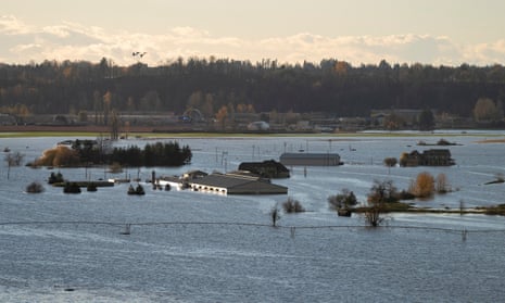 Rising flood waters surround buildings in Abbotsford, BC on Tuesday, 16 November 2021.