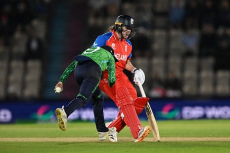 Aimee Maguire of Ireland collides with Nat Sciver-Brunt