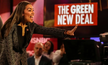Alexandria Ocasio-Cortez greets the audience following a televised town hall event in New York in March
