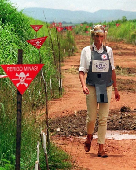 Princess Diana walking through a minefield in Angola in 1997