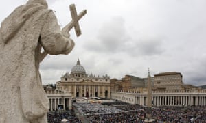 Catholic devotees fill St Peter’s Square during a canonisation ceremony by Pope Francis for two of his predecessors.