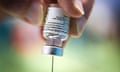 A needle is inserted into a Pfizer-BioNTech Covid vaccine