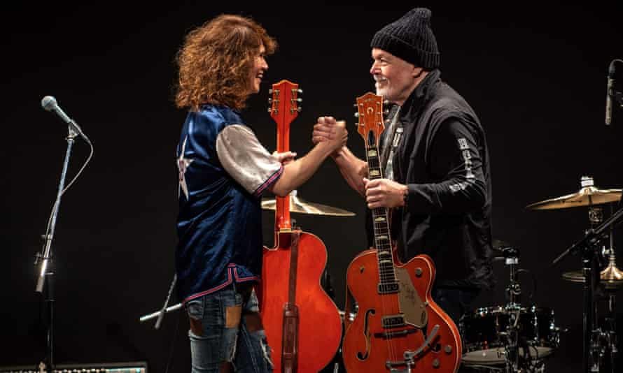 Bachman receives his old Gretsch from Japanese musician Takeshi at a Tokyo concert on Friday