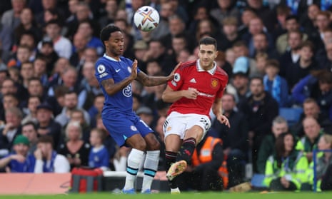 Chelsea’s Raheem Sterling in action with Manchester United’s Diogo Dalot.
