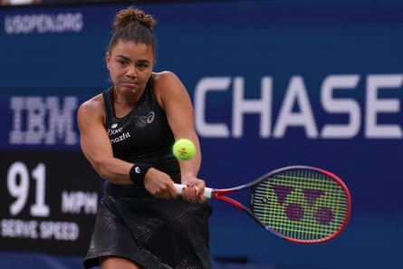 Jasmine Paolini hits a tennis ball at the US Open